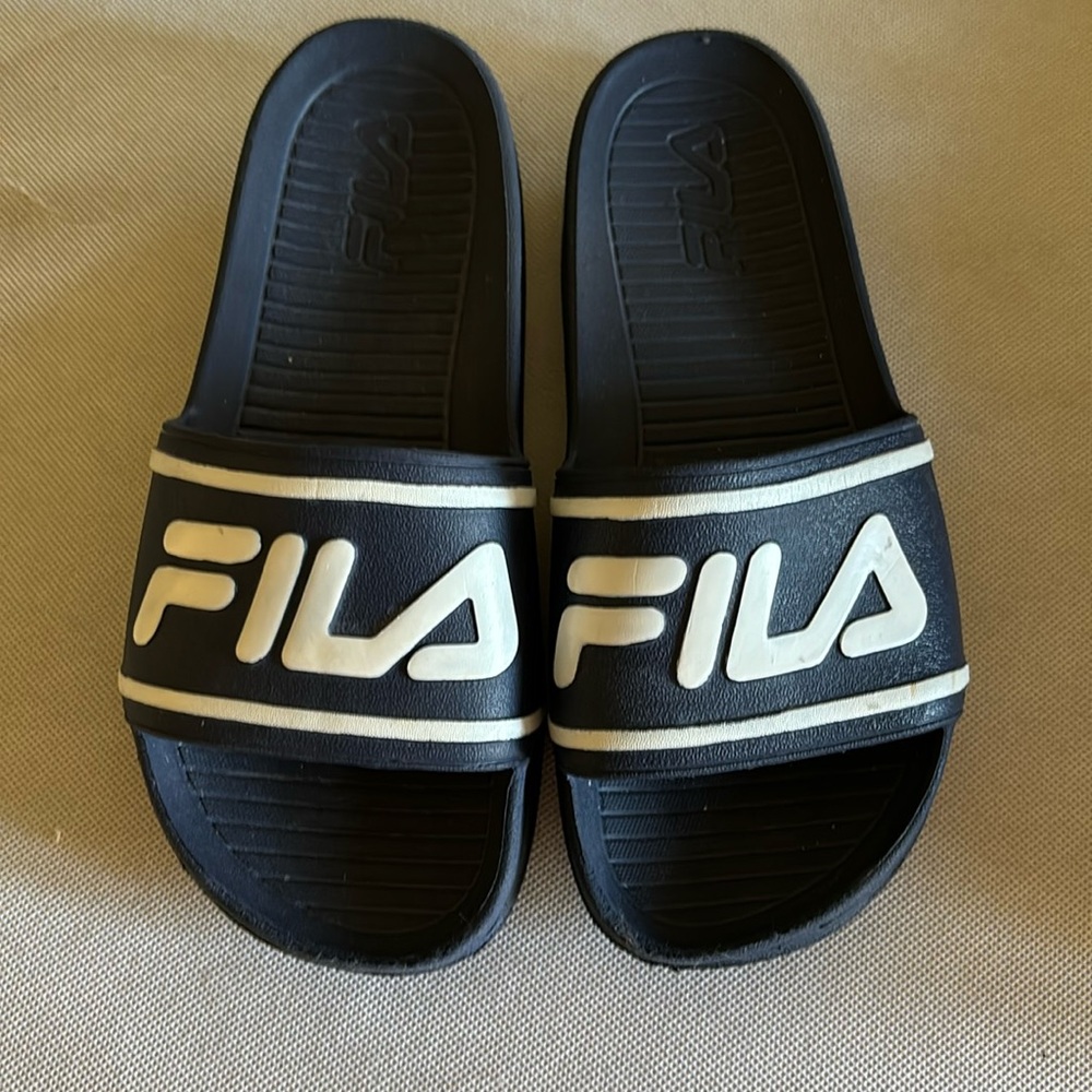 Navy and white fila slides